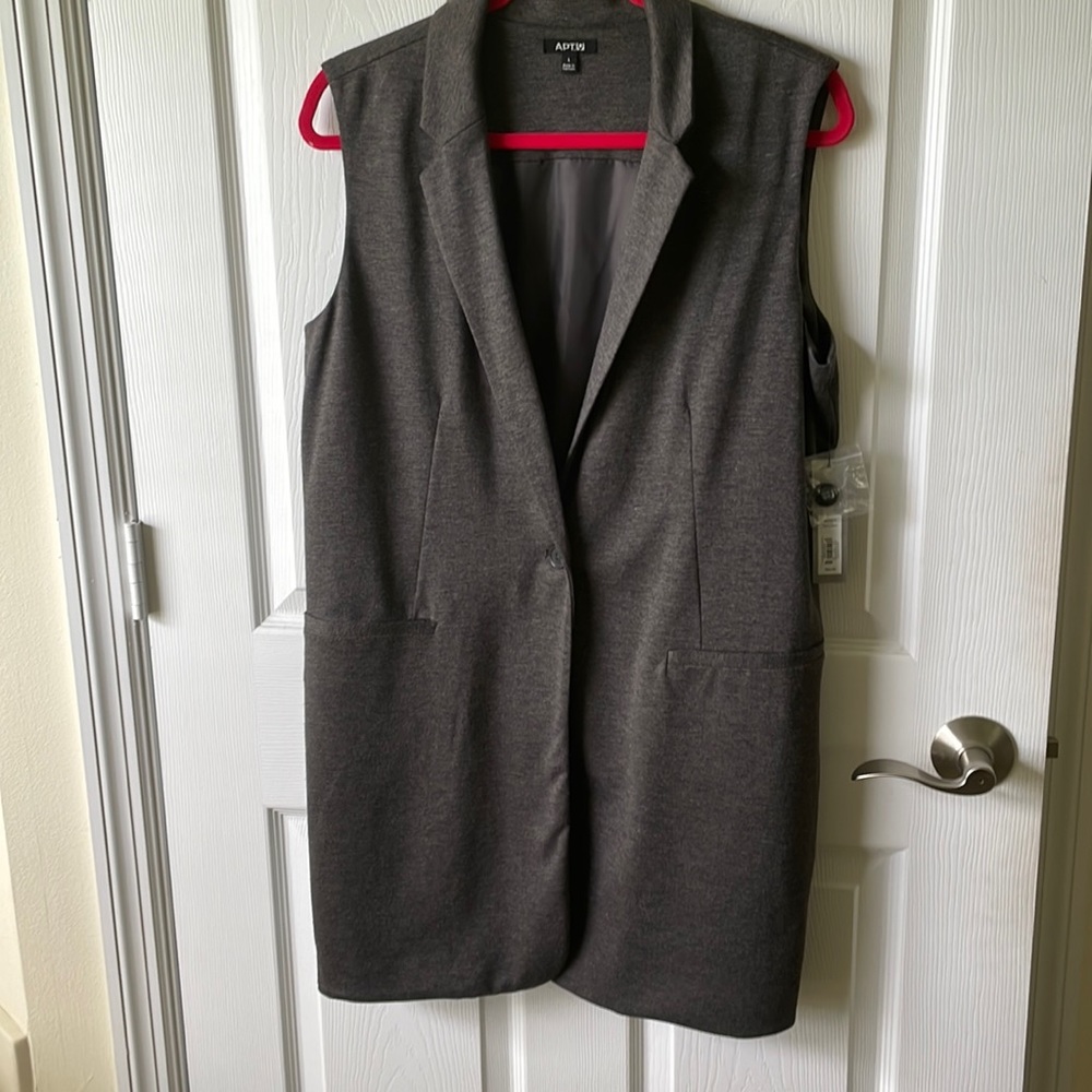 Sleeveless long vest brand new with tags dark gray in color